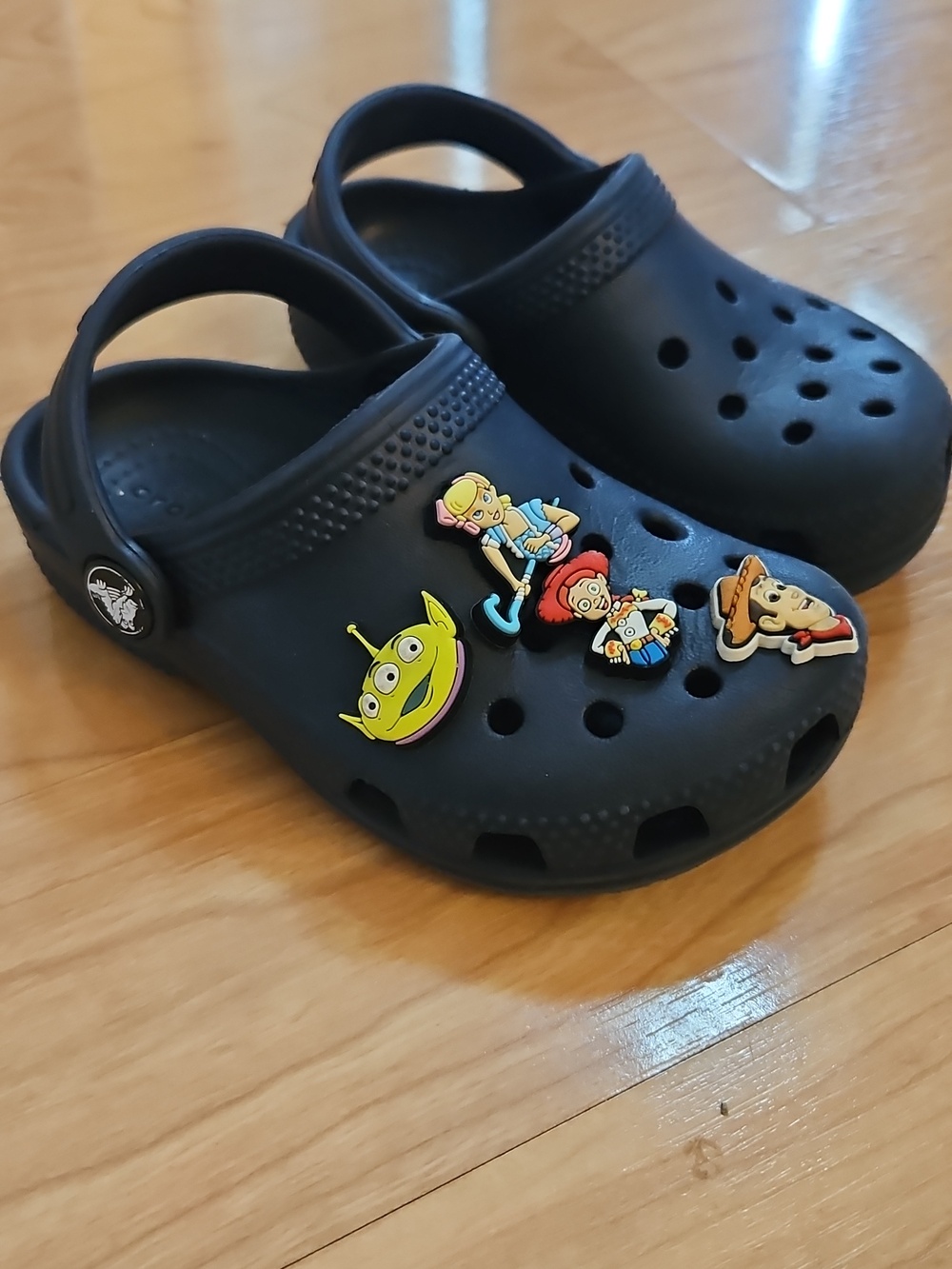 CROCS Kids Black Clog with Toy Story Jibbitz Charms